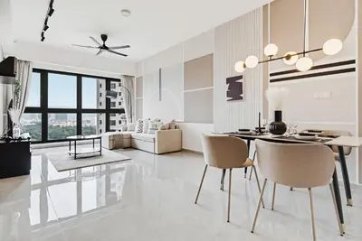 a white living room with a dining table and chairs at Deluxe 2BR Agile Bukit Bintang by RumaBnB in Kuala Lumpur