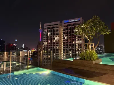 a view of a city skyline at night at KLCC Majestic Residence By Vglory Home in Kuala Lumpur