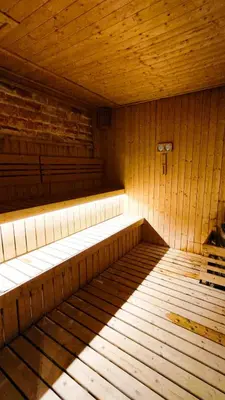 an empty sauna with a wooden floor and wooden ceilings at Axon Residence Bukit Bintang Pavilion TRX by Fie in Kuala Lumpur