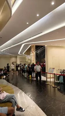 a group of people standing around in a shopping mall at Axon Residence Bukit Bintang Pavilion TRX by Fie in Kuala Lumpur
