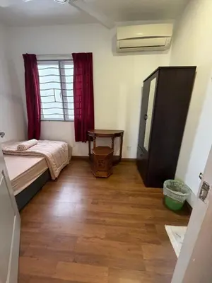 a small room with a bed and a window at Happy Homes 1 Kuala Lumpur in Kuala Lumpur