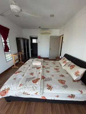 a bedroom with a large bed in a room at Happy Homes 1 Kuala Lumpur in Kuala Lumpur