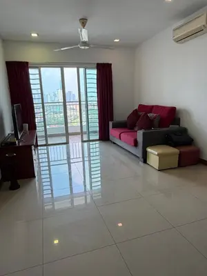 a living room with a couch and a table at Happy Homes Kuala Lumpur 21-12 in Kuala Lumpur