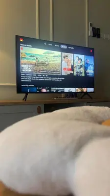 a flat screen tv in a room with a bed at Razak City Sunset HHhomestay 2R 2B Netflix Utube in Kuala Lumpur