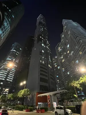 a group of tall buildings in a city at night at SKY suits private room apartments in Kuala Lumpur