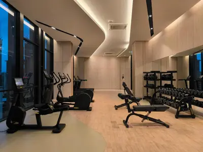 a gym with treadmills and exercise equipment in a building at Tour & Travel Malaysia Axon Residence Bukit Bintang KL in Kuala Lumpur
