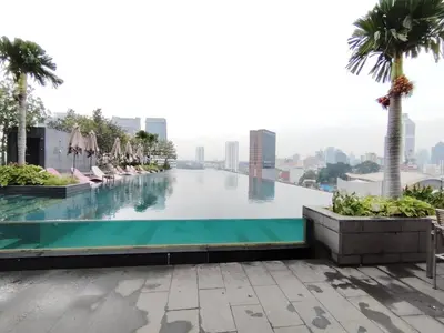 a swimming pool on the roof of a building at First World Suite At Opus Residence KL 118 in Kuala Lumpur