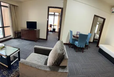 a living room with a couch and a table at Apartment TS at Times Square in Kuala Lumpur