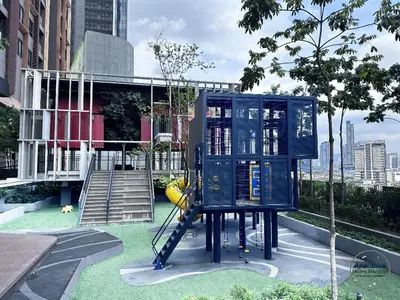 a playground in a city with a blue box at Lucentia Premium stay Kuala Lumpur in Kuala Lumpur