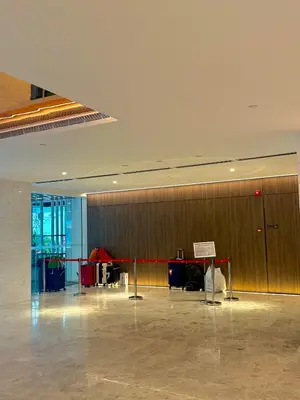 an empty lobby with a desk in a building at Kualalumpur Quill Residences Suites By KLCC in Kuala Lumpur