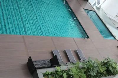 an overhead view of a swimming pool in a building at Regalia SkyPool8 in Kuala Lumpur