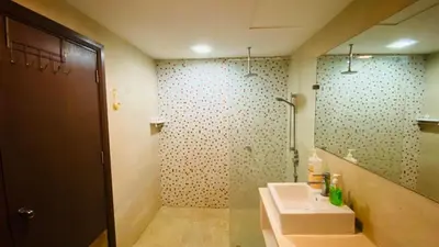 a bathroom with a sink and a mirror at Regalia skypool8 in Kuala Lumpur