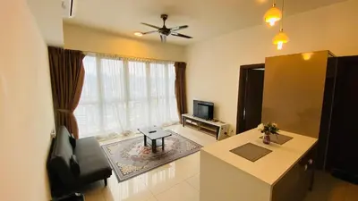 a living room with a ceiling fan and a television at Regalia skypool8 in Kuala Lumpur