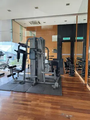 a gym with treadmills and exercise equipment in a building at Casa Bukit Bintang By Eryan Guest House in Kuala Lumpur
