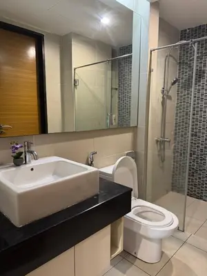a bathroom with a sink and a toilet at Casa Bukit Bintang By Eryan Guest House in Kuala Lumpur