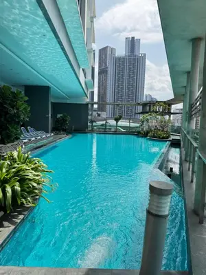 a large swimming pool on the roof of a building at Casa Bukit Bintang By Eryan Guest House in Kuala Lumpur