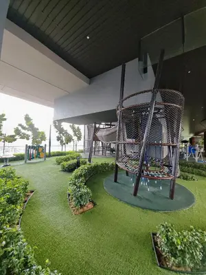 a playground in a building with a slide at Kuala Lumpur Services Apartments In A X O N Residence in Kuala Lumpur