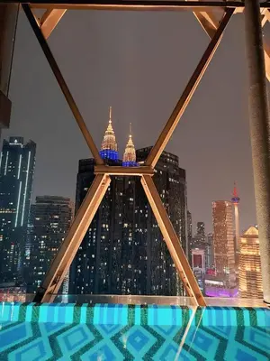 a view of the empire state building from the top of a skyscraper at Scarletz Suites KLCC by near twin tower in Kuala Lumpur