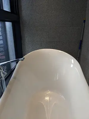 a close up of a white toilet in a bathroom at Alion Sutis KLCC At Scarlets in Kuala Lumpur