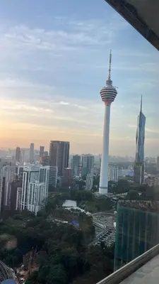 a view of a city with a tower and buildings at Oras Suites At platinum KLCC in Kuala Lumpur