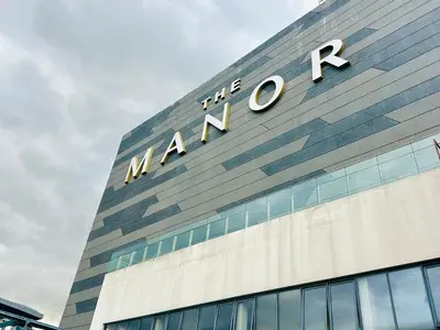 a large building with theania sign on top of it at Dreamy KLCC Luxury Haven in Kuala Lumpur