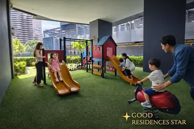 a group of children playing on a playground at Good Residences at Star KLCC in Kuala Lumpur