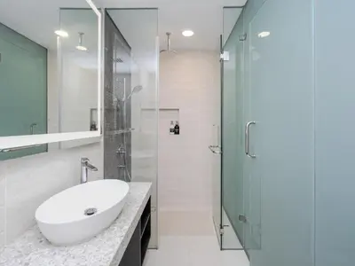 a bathroom with a sink and a shower at Star KLCC Cosy Twin Tower Suite 2-3pax in Kuala Lumpur