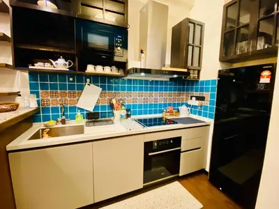 a kitchen with a sink and a stove at Opus Residence 1R1B Pinwu 118 view|Balcony|LRT in Kuala Lumpur