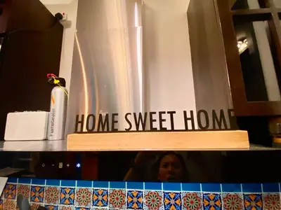 a sign that says home sweet home on a kitchen counter at Opus Residence 1R1B Pinwu 118 view|Balcony|LRT in Kuala Lumpur