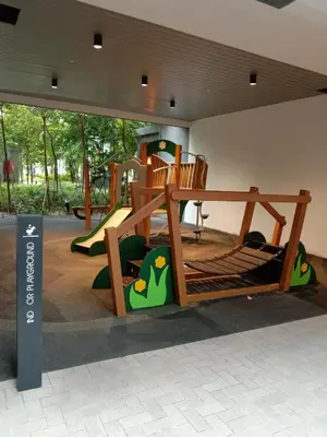 a playground in a building with a slide at Agile Bukit Bintang Sleepy in Kuala Lumpur