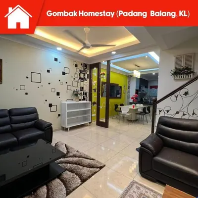 a living room with a couch and a table at Gombak Fatin Homestay in Kuala Lumpur