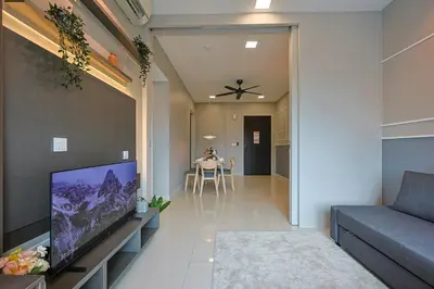 a living room with a large flat screen tv at Elegant Skyline Suite # Datum Jelatek near KLCC in Kampong Datok Keramat