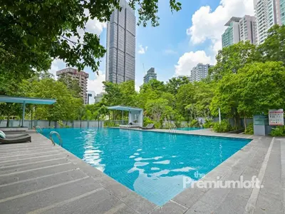 a swimming pool in a city with tall buildings at The Premium Lofts Bukit Bintang in Kuala Lumpur