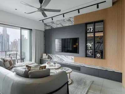 a living room with a couch and a tv at Prime Location KLCC - next to MRT in Kuala Lumpur