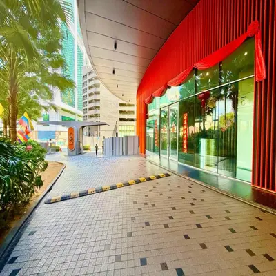 a building with a red curtain on the side of it at sky suites by klcc in Kuala Lumpur