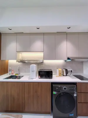 a kitchen with a sink and a dishwasher at Agile suits of Kuala Lumpur in Kuala Lumpur