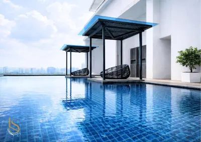 a swimming pool on the roof of a building at LUXORA SUITE's REIZZ RESIDENCE in Kuala Lumpur