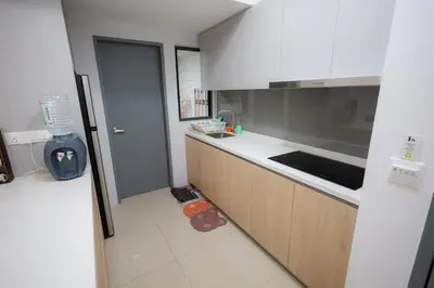 a kitchen with a sink and a counter at M Arisa Sentul by A&T in Kuala Lumpur