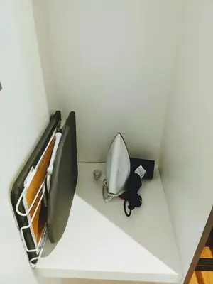 a bathroom with a toilet in a small room at Victoria Suites Quill Residence KLCC in Kuala Lumpur