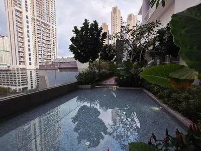 a swimming pool on the roof of a building at Aurelia Suites Quill Residences in Kuala Lumpur