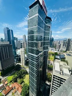 a tall building with a sign on top of it at City towen klcc by TTR in Kuala Lumpur