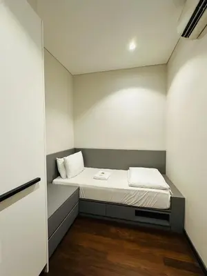 a small bedroom with a bed in a room at City towen klcc by TTR in Kuala Lumpur