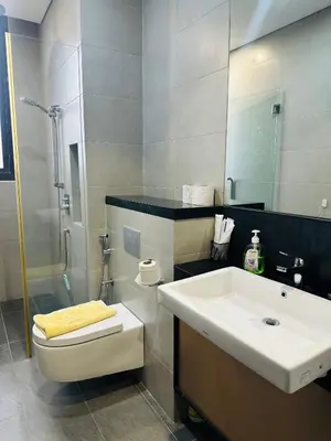 a bathroom with a sink and a toilet and a shower at City towen klcc by TTR in Kuala Lumpur
