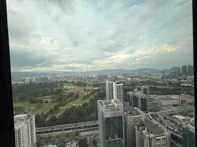 a view of a city with tall buildings at Bukit Bintang Suites KLCC by YBS in Kuala Lumpur