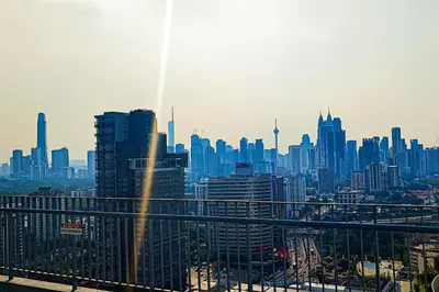 a view of a city skyline with skyscrapers at Sky Pool at 3 Towers Ampang by HCK in Kuala Lumpur