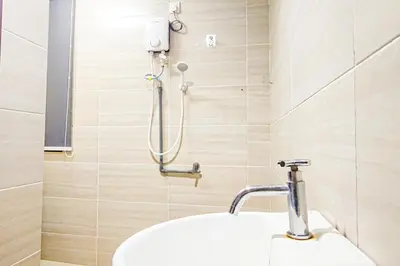 a bathroom with a shower and a sink at Sky Pool at 3 Towers Ampang by HCK in Kuala Lumpur