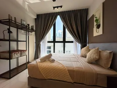 a bedroom with a bed with a large window at service apartment majestic city center klcc in Kuala Lumpur