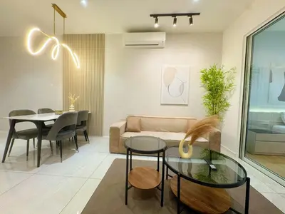 a living room with a couch and a table at Veone Hotel Kuala Lumpur in Kuala Lumpur
