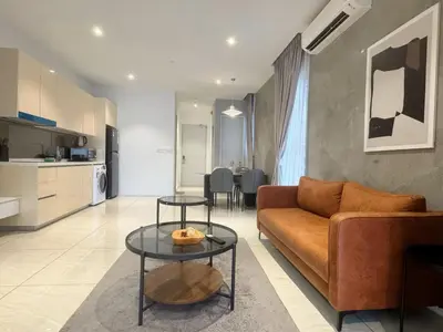a living room with a couch and a table at Veone Hotel Kuala Lumpur in Kuala Lumpur