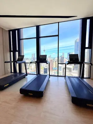 an empty gym with a view of the city at Luxury Axon Residence Bukit Bintang KLCC Pavilion By EQZ in Kuala Lumpur